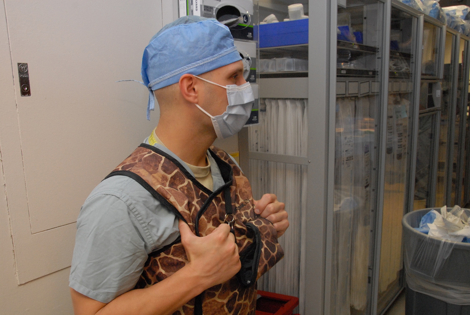 Oregon Air National Guard Staff Sgt. Gregory Snegireff, a medic with the 142nd Medical Group, observes a pacemaker procedure in the Cardio Cath Lab at Tripler Army Medical Center, in Honolulu, Hawaii, Aug. 29, 2018. Snegireff and his fellow Airmen took part in Medical Facilities Annual Training, Aug. 18-31, 2018, and were able to assist in a real-world support mission when Hurricane Lane threatened to strike the Hawaiian Islands the week of Aug. 20, 2018. (U.S. Air National Guard photo by Master Sgt. Nick Choy)