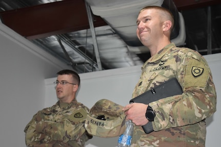 U.S. Army Capt. William Parker and U.S. Army Staff Sgt. Bryan Parker, activated members of the Kentucky Army National Guard 613th Engineering Facilities Detachment, serve as contract officer representatives for Area Support Group-Kuwait Directorate of Public Works at Camp Arifjan, Kuwait, August 6, 2018.