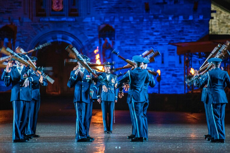 The U.S. Air Force Honor Guard Drill Team performs during the Royal Edinburgh Military Tattoo on the Esplanade of the Edinburgh Castle, in Edinburgh, Scotland, Aug. 13, 2018. Performers from 48 countries performed with the Honor Guard, with an audience of 220,000 viewers, and a televised viewer base of 100 million worldwide. (U.S. Air Force photo by Airman 1st Class Michael S. Murphy)