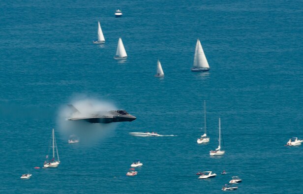 Capt. Andrew “Dojo” Olson, F-35 Heritage Flight Team pilot and commander, performs a high speed pass in an F-35A Lightning II over Lake Michigan during the Chicago Air and Water Show in Chicago, Aug. 19, 2018. The F-35A Lightning II is equipped with the largest single engine motor ever built and is capable of reaching speeds of up to 1,200 miles per hour. (U.S. Air Force photo by Airman 1st Class Alexander Cook)