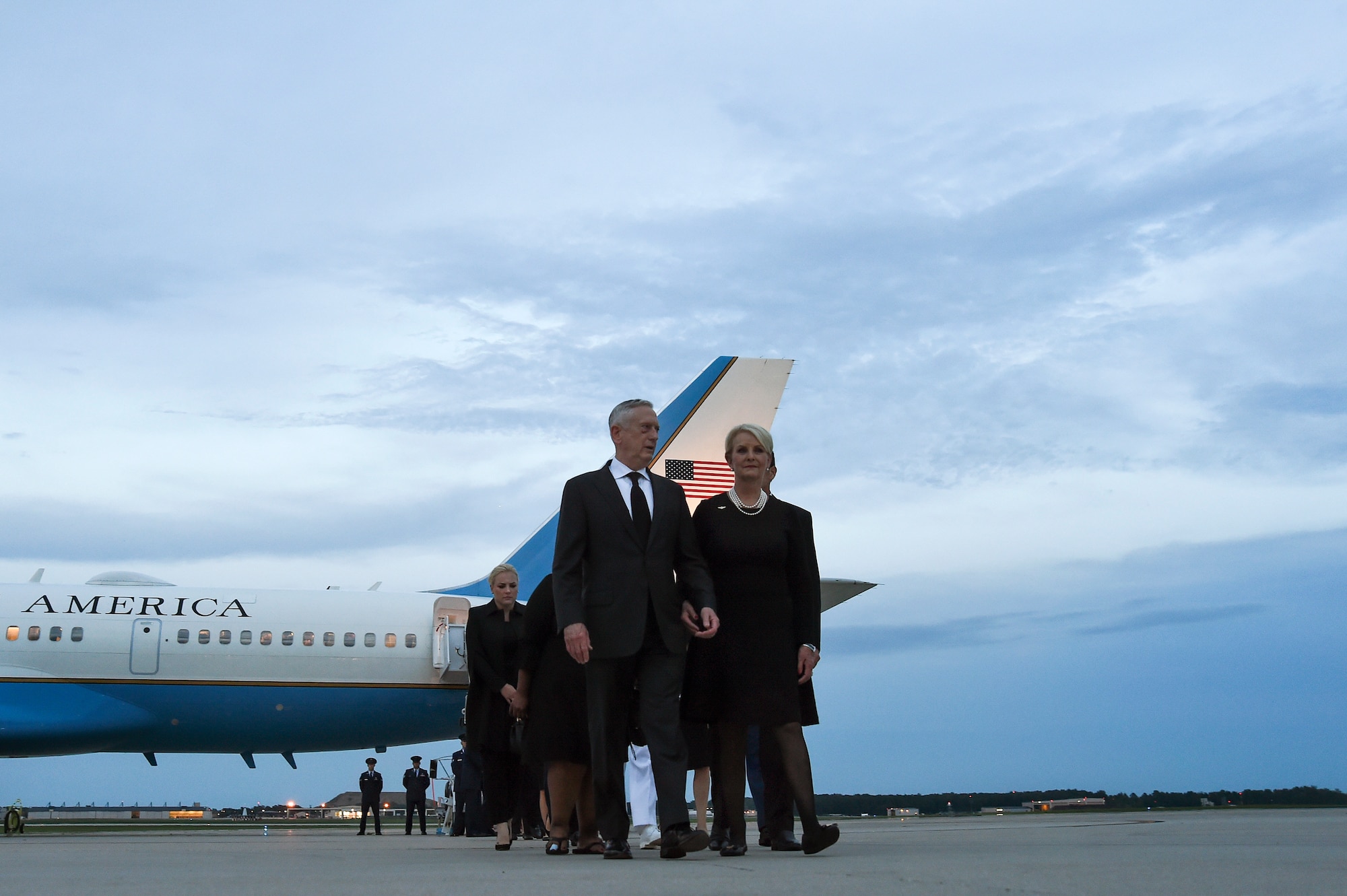 U.S. Secretary of Defense James N. Mattis walks with Cindy McCain, wife of Senator John McCain after greeting her at the steps of an 89th Airlift Wing C-32 aircraft upon arrival at Joint Base Andrews, Md., Aug. 30, 2018. The aircraft arrived with the remains of McCain and his family. (U.S. Air Force photo by Staff Sgt. Kenny Holston)