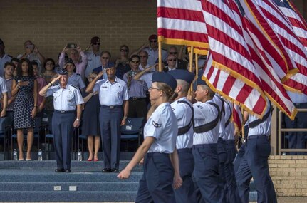 U.S. Air Force Chief of Staff Gen. David L. Goldfein and Chief Master Sgt. of the Air Force Kaleth O. Wright salute during a basic military training graduation Aug. 30, 2018
