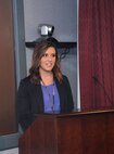 Cheyenne Christian, a student intern with the Furnishings Branch at Huntsville Center, makes a presentation to members of the command and staff of the U.S. Army Engineering and Support Center, Huntsville, July 30. Christian and 10 other students have been working through the summer at Huntsville Center in various departments to build their real-world skills before completing their college degrees.