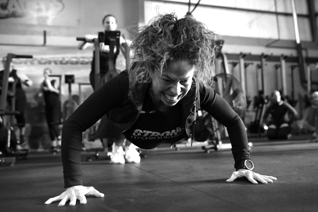 Esmin Feliciano participates in a Strong Camp workout Nov. 10, 2018, in Suffield, Connecticut. The camp was put on by Tech. Sgt. Dacia Lucas, 104th Maintenance Group aircraft engine mechanic, and empowered women through the promotion of resilience. (U.S. Air National Guard photo by Airman 1st Class Randall S. Burlingame)