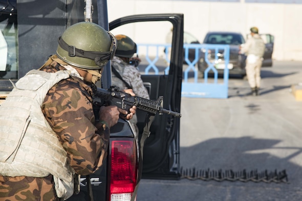 Royal Jordanian Air Force force protection professionals provide overwatch during a simulated entry control stop at a base outside of Amman, Jordan Nov. 27.  The simulation was part of a joint partnership training exercise with U.S. Forces visiting there.  (U.S. Air Force photo by Staff Sgt. Stephen Eigel)
