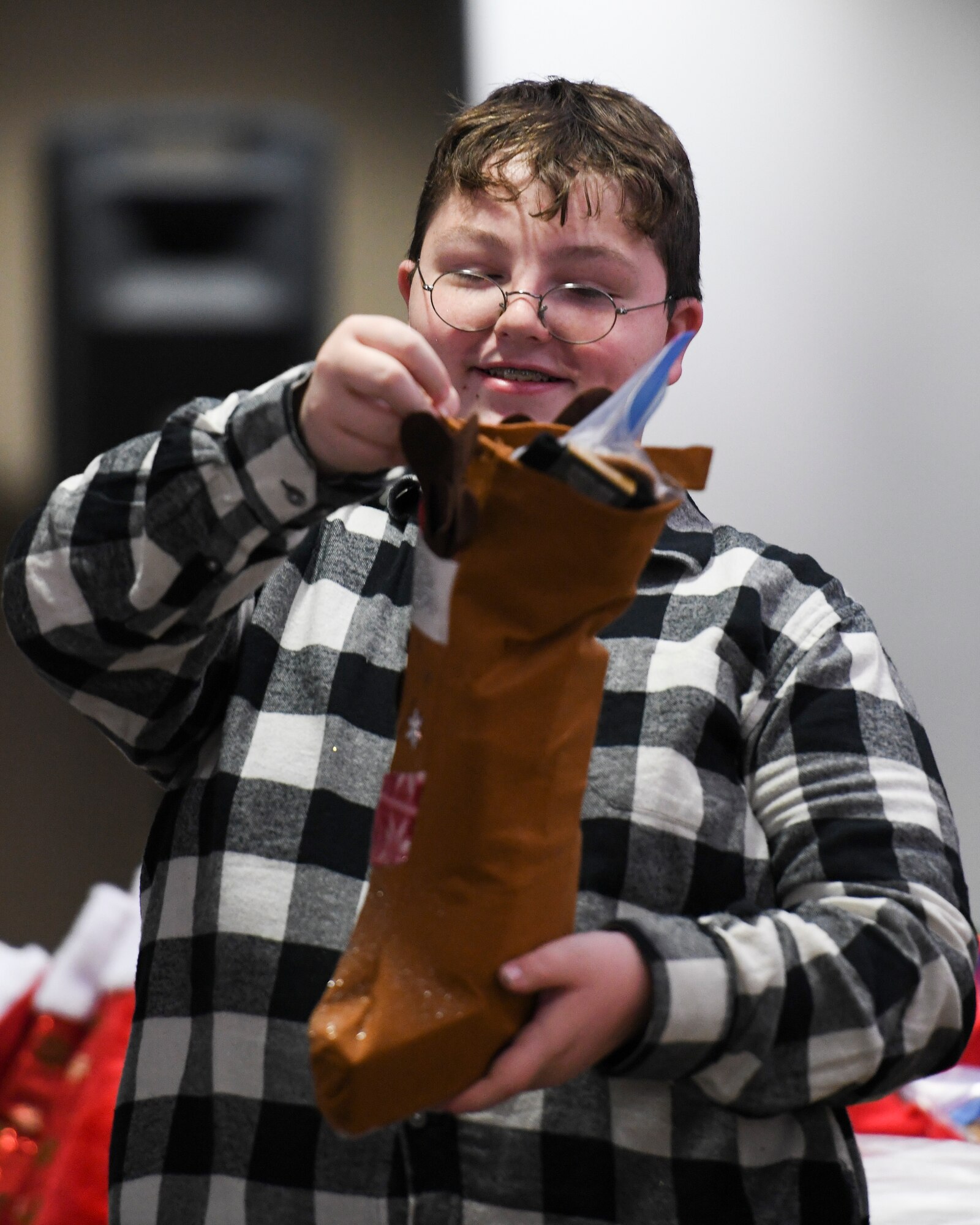 The 910th Airlift Wing’s Key Spouses and other volunteers stuffed stockings and made Christmas decorations for Airmen deployed over the holiday season on Nov. 30, 2018, in the Community Activity Center at Youngstown Air Reserve Station.