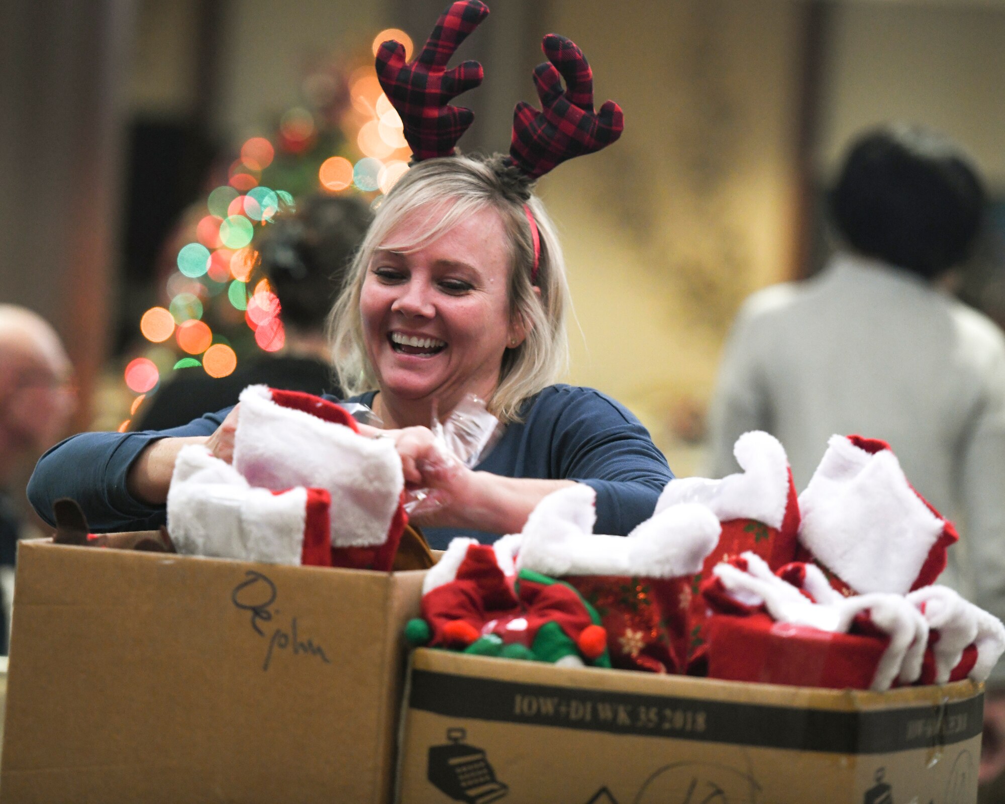 The 910th Airlift Wing’s Key Spouses and other volunteers stuffed stockings and made Christmas decorations for Airmen deployed over the holiday season on Nov. 30, 2018, in the Community Activity Center at Youngstown Air Reserve Station.