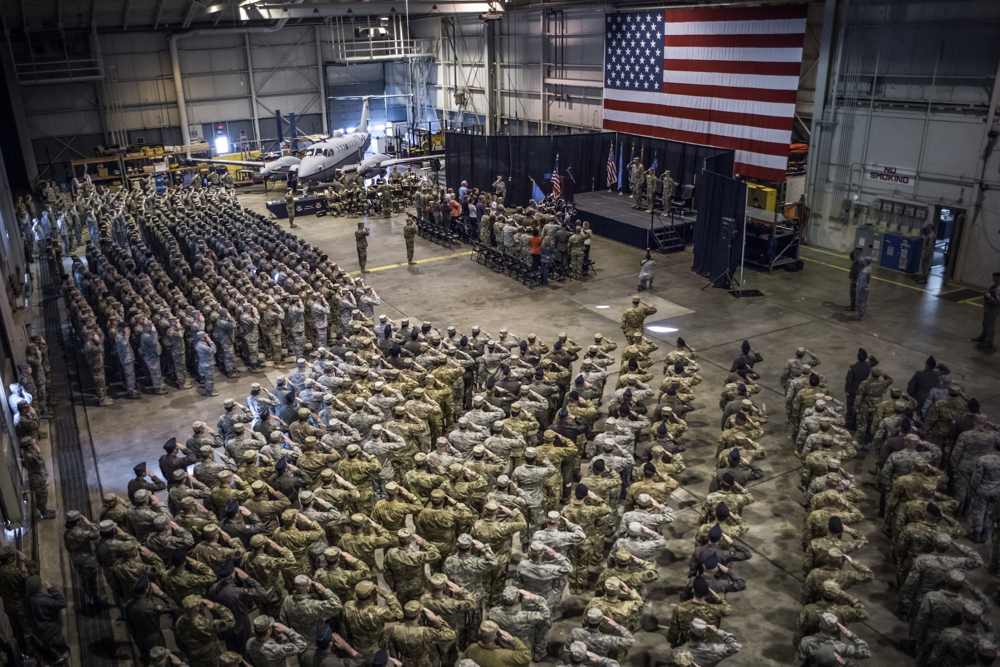 Members of the 137th Special Operations Wing gather for a change of command ceremony at Will Rogers Air National Guard Base in Oklahoma City, Dec. 1, 2018. After 32 years of service in the Oklahoma Air National Guard, Col. Devin R. Wooden relinquished command of the 137th SOW to Col. Daniel R. Fowler. Fowler is the 17th commander of the Wing in its history and is the only the second wing commander since its conversion to a special operations wing in 2015. (U.S. Air National Guard photo by Staff Sgt. Tyler Woodward)