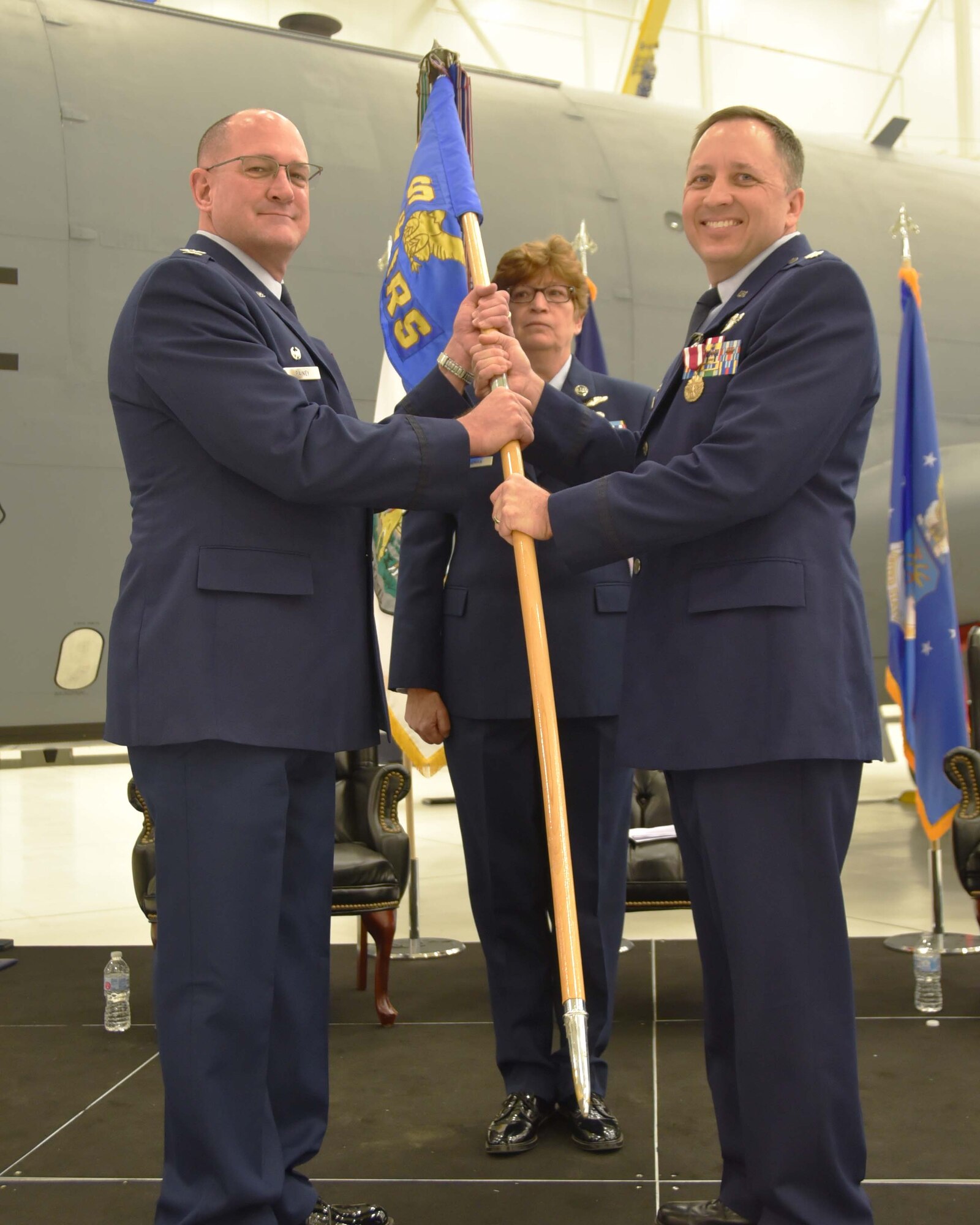 Maj. Gen. Randall A. Ogden, 4th Air Force commander, hands the guidon to Col. Phil Heseltine, incoming 931st Air Refueling Wing commander, during a change of command ceremony Dec. 1, 2018, McConnell Air Force Base, Kan.  Prior to joining the 931st, Heseltine was the vice commander of the 22nd Air Refueling Wing, the active duty component at Team McConnell.  Heseltine is the first colonel to retire from the active duty to join the Air Force Reserve as a wing commander. (U.S. Air Force photo by Tech. Sgt. Abigail Klein)