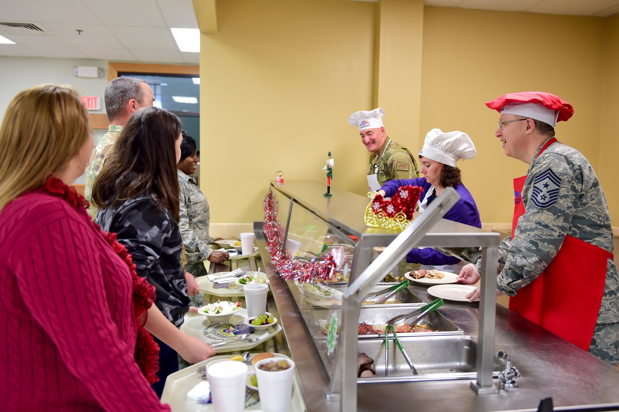 Grissom leadership serves holiday feast