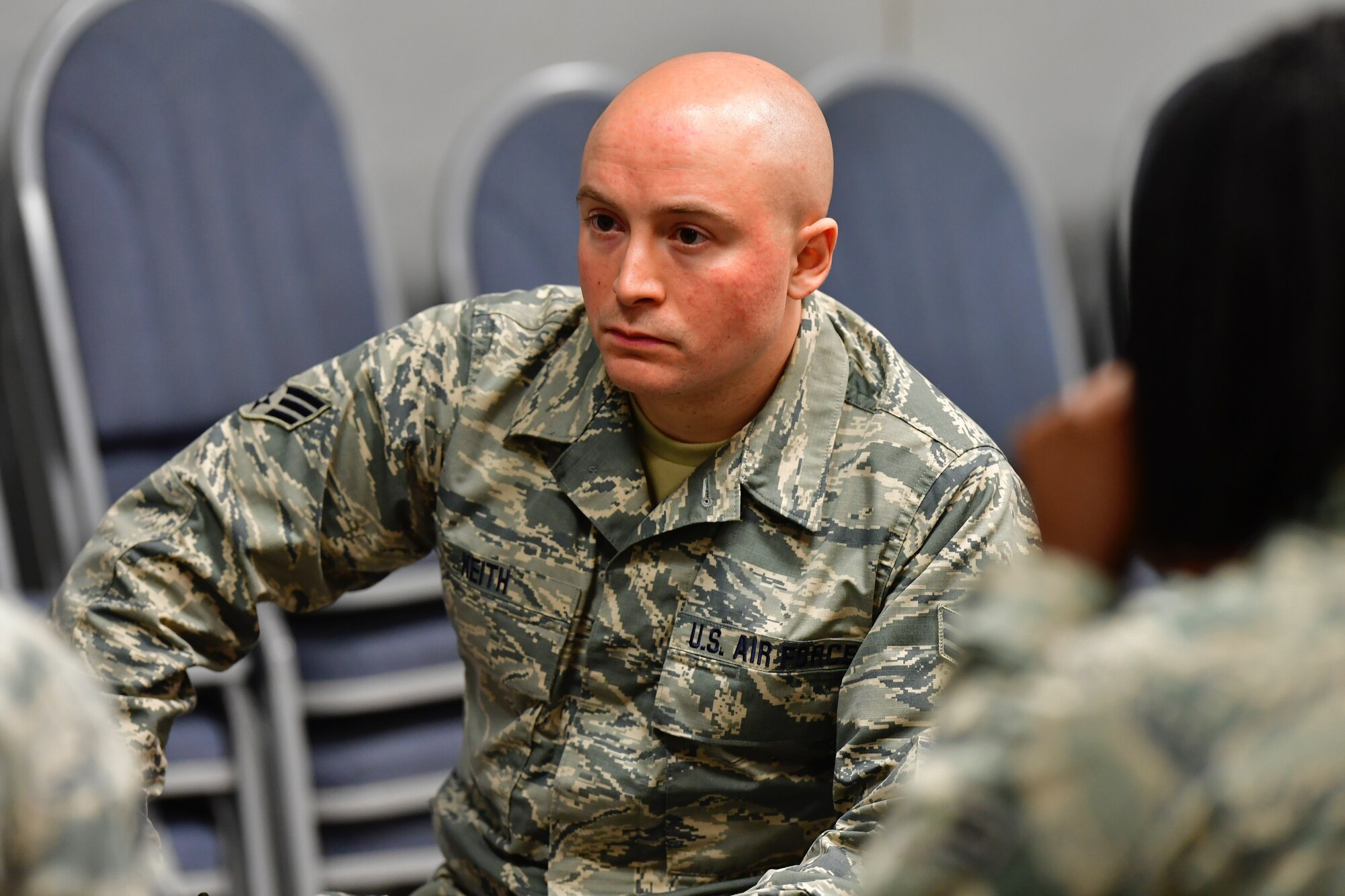 Senior Airman Jonathan Keith, 166th Logistics Readiness Squadron air transportation journeyman, listens to a senior leader at the first Delaware Air National Guard Speed Mentoring Event, Dec. 1, 2018 at New Castle Air National Guard Base, Delaware. During this event, Airmen were granted opportunities to partake in two-way communication with senior leaders about various topics. (U.S. Air National Guard photo by Staff Sgt. John Michaels)