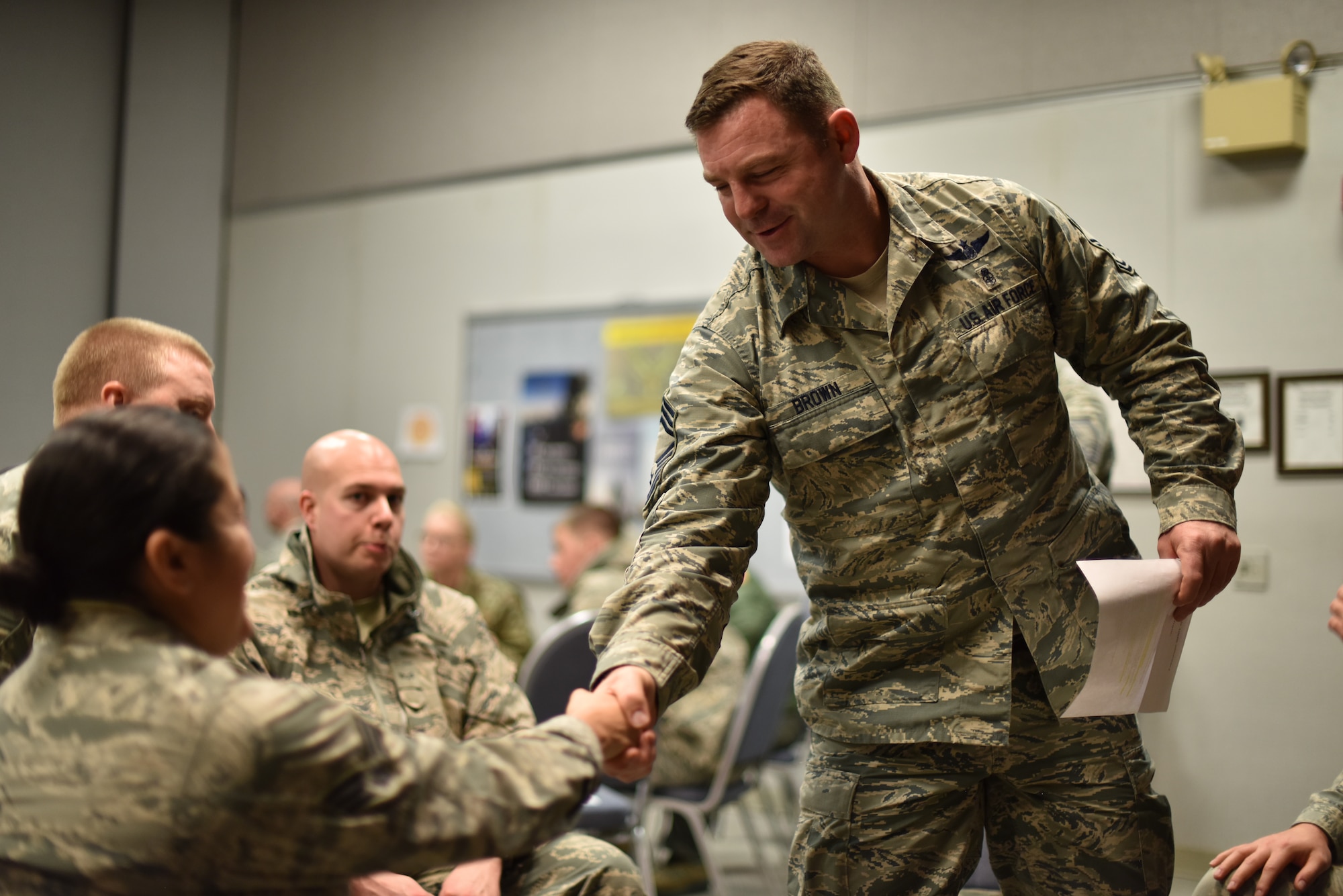 Chief Master Sgt. Summer Brown, 166th Operations Group Superintendent, addresses Airmen at the first Delaware Air National Guard Speed Mentoring Event, Dec. 1, 2018 at New Castle Air National Guard Base, Delaware. This event allowed young Airmen to engage with senior leaders to address concerns, discuss military-related topics and gain a deeper understanding of how their Air Force specialty code impacts the state and national missions in a round-table discussion fashion. (U.S. Air National Guard photo by Staff Sgt. Shawn Lowe)