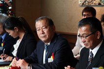 Ginowan City Mayor Masanori Matsugawa listens during a meeting Nov. 29 at Terra Restaurant aboard Camp Foster, Okinawa, Japan.