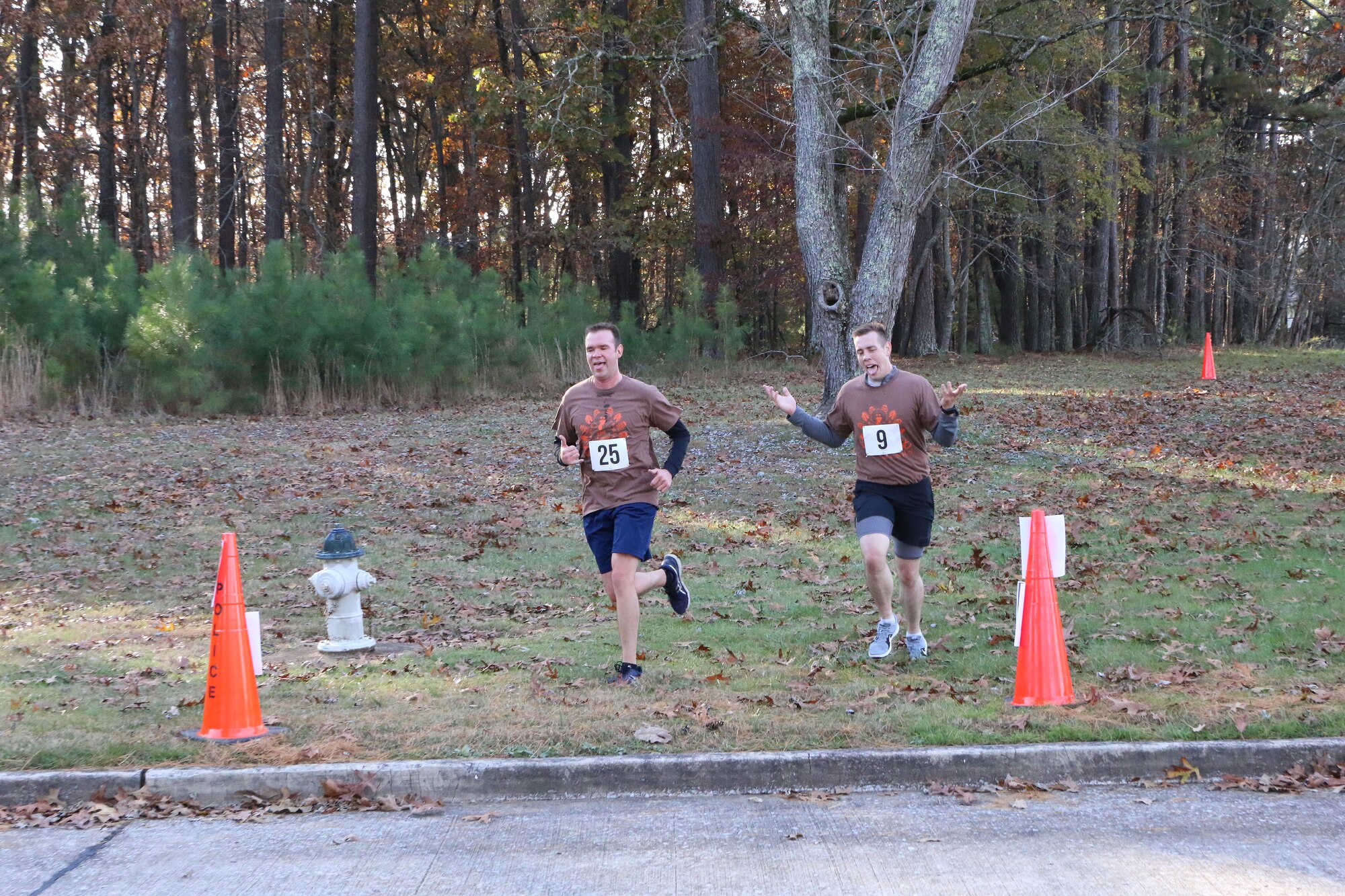 Lt. Johnathan Gutierrez, left, and Lt. Tom Sinemus prepare to tackle the home stretch of the 33rd Annual AEDC Turkey Trot. The 5K was held Nov. 16 at Arnold Air Force Base. (U.S. Air Force photo by Brad Hicks)