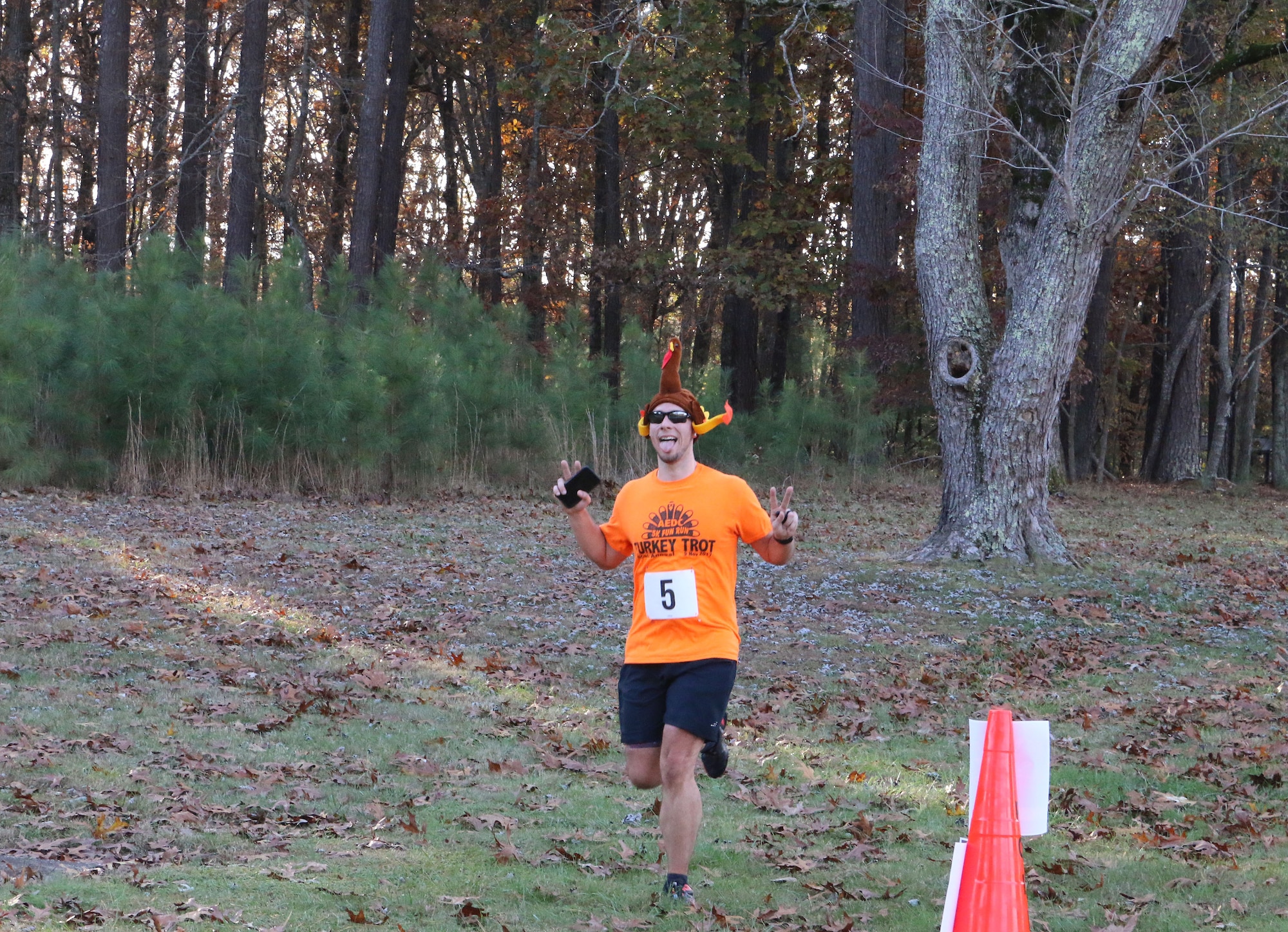 Justin Price displays his Thanksgiving spirt as he nears the end of the 33rd Annual AEDC Turkey Trot. The 5K was held Nov. 16 at Arnold Air Force Base. (U.S. Air Force photo by Brad Hicks)