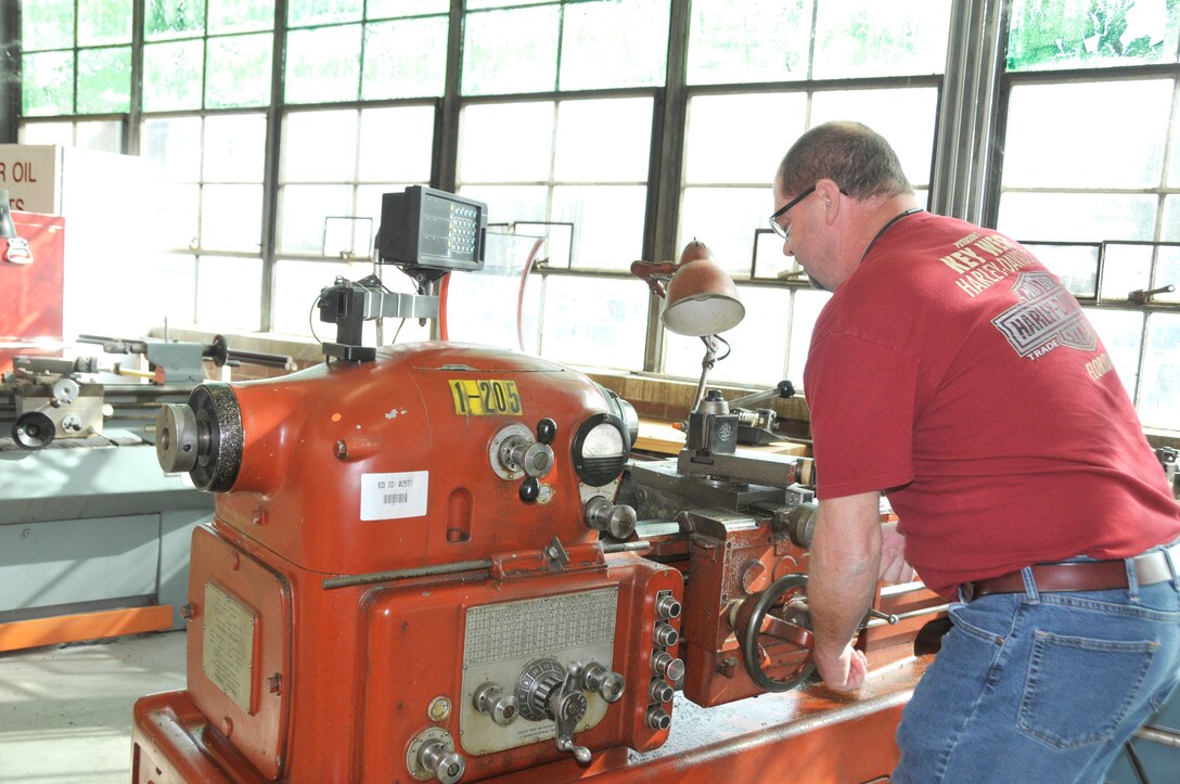 Jeff Youngblood, machinist, operates a lathe in the Base Civil Engineering machine shop at Arnold Air Force Base. (U.S. Air Force photo by Deidre Ortiz)