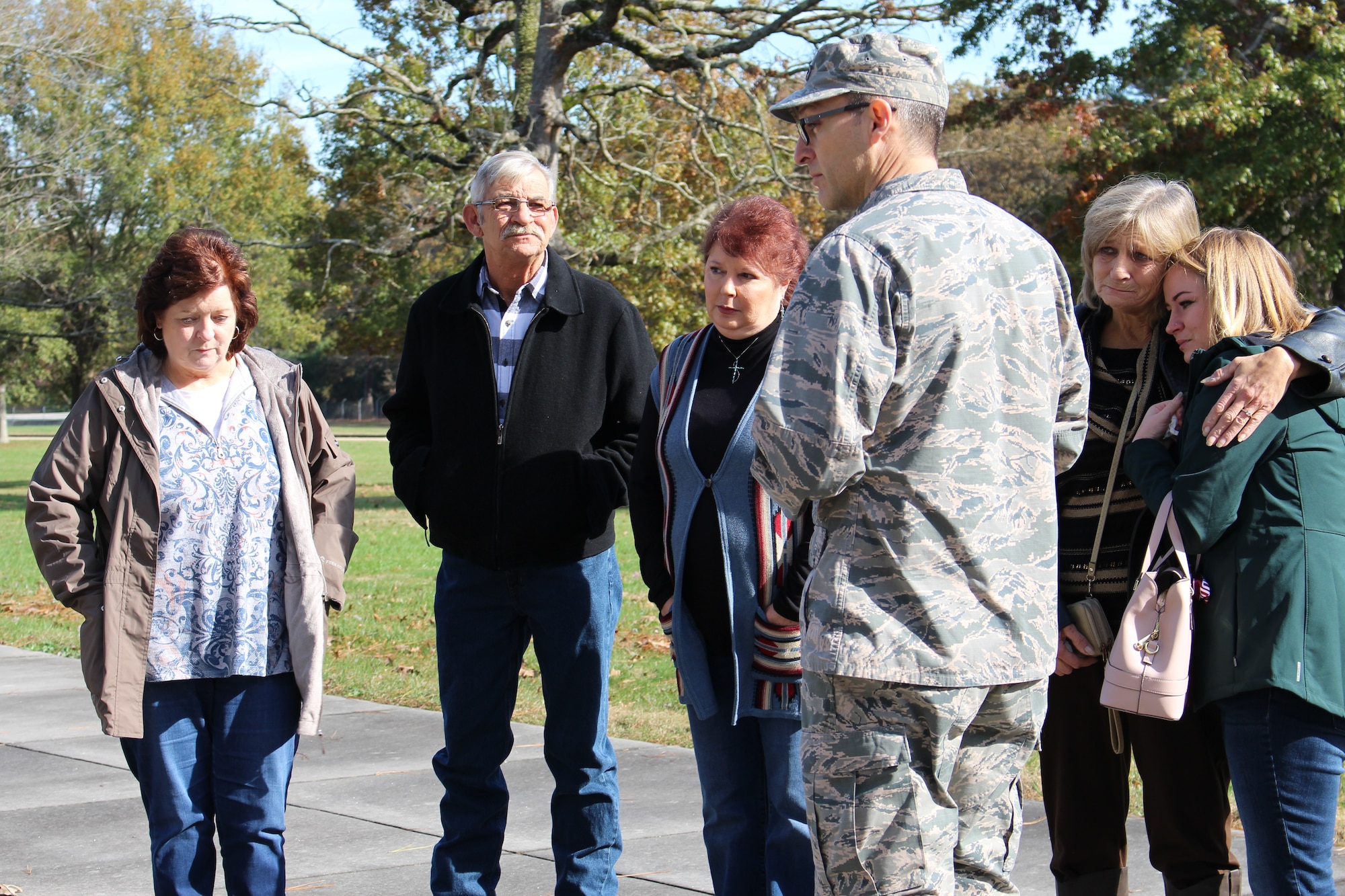 AEDC Commander Col. Scott Cain speaks to the family of the late Wilmer Adam Anderson, an AEDC concrete laborer, who visited Arnold Air Force Base Nov. 16 to view the memorial dedicated to those who lost their lives in service to Arnold. Cain explained importance of the J-4 crew’s work and how the facility has gone on to play a huge role in the development of today’s missile capabilities. (U.S. Air Force photo by Deidre Ortiz)