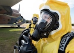 59th Medical Wing bioenvironmental engineers call in a contamination emergency during a MASCAL exercise on Joint Base San Antonio-Lackland, Texas. The exercise tested the clinical and field response teams’ communication efficiency between wing personnel and the medical control center. (U.S. Air Force photo by Staff Sgt. Kevin Iinuma)