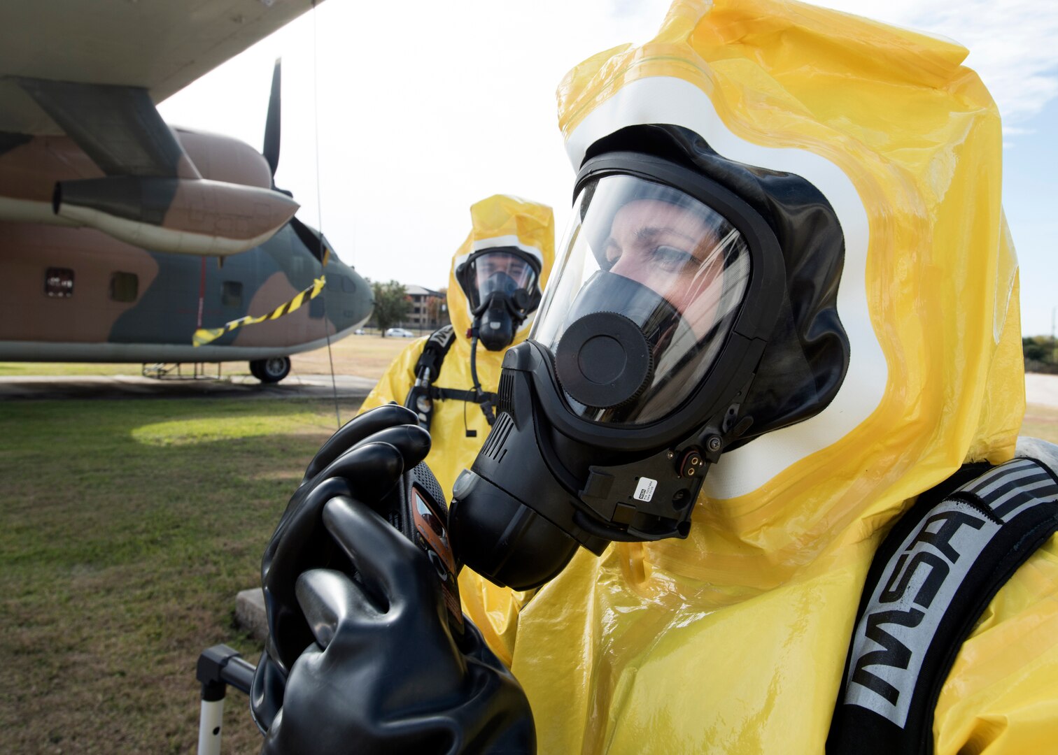 59th Medical Wing bioenvironmental engineers call in a contamination emergency during a MASCAL exercise on Joint Base San Antonio-Lackland, Texas. The exercise tested the clinical and field response teams’ communication efficiency between wing personnel and the medical control center. (U.S. Air Force photo by Staff Sgt. Kevin Iinuma)