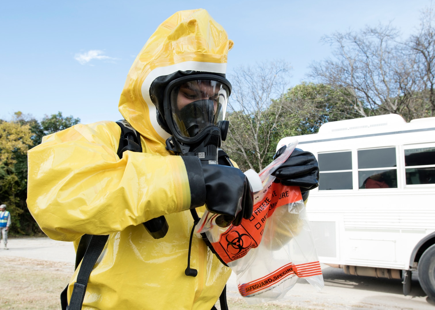 A bioenvironmental engineer from the 59th Medical Wing prepares a chemical sample for transfer during a MASCAL exercise on Joint Base San Antonio-Lackland, Texas. The chemical was tested to determine if it was toxic or non-toxic. (U.S. Air Force photo by Staff Sgt. Kevin Iinuma)