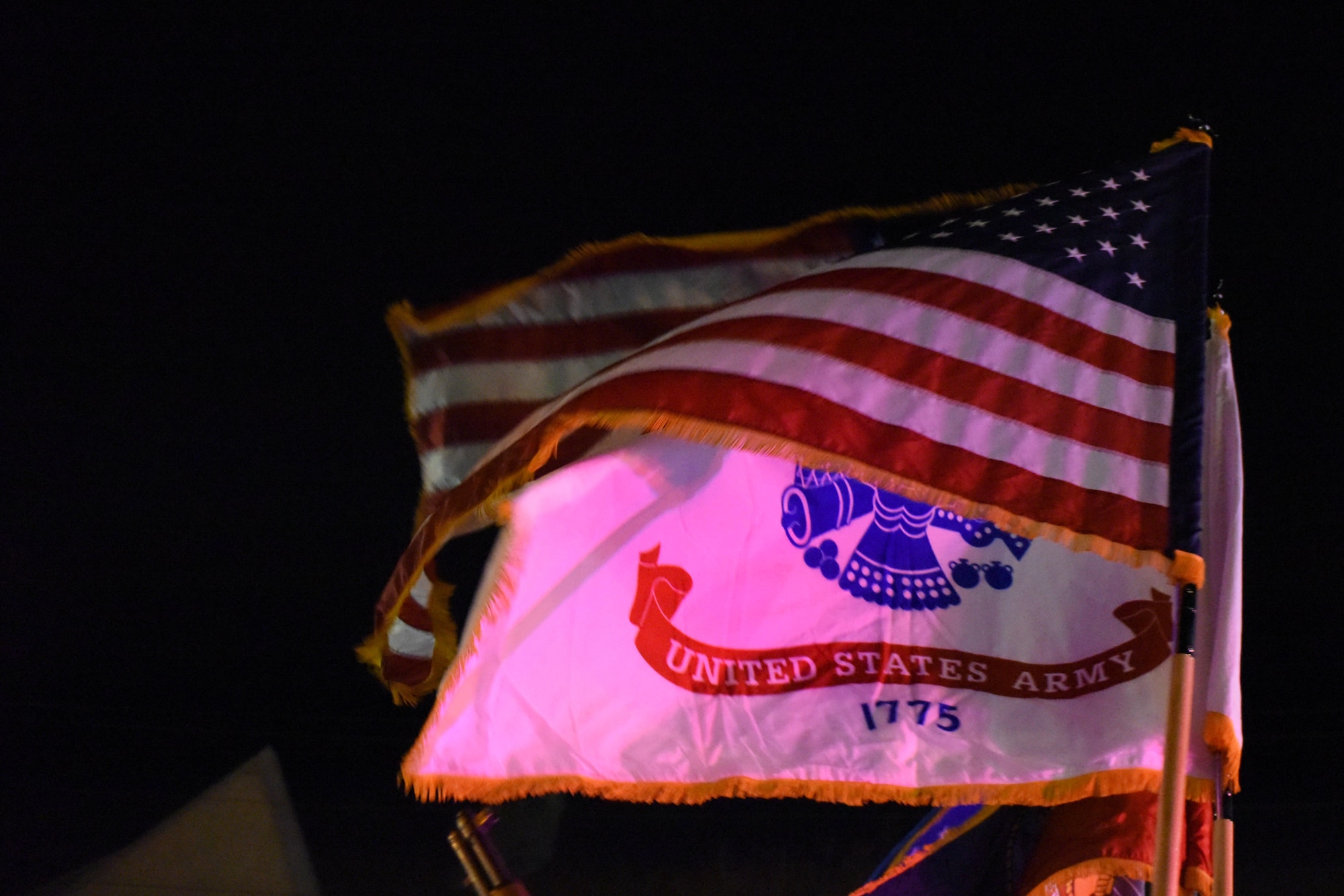 The U.S. Flag waves during the 18th annual Lights of Christmas Parade in San Angelo, Texas, Dec. 1, 2018. The Goodfellow Air Force Base Joint Color Guard led the parade, carrying the U.S. Flag and a flag for each military branch. (U.S. Air Force photo by Senior Airman Randall Moose/Released)