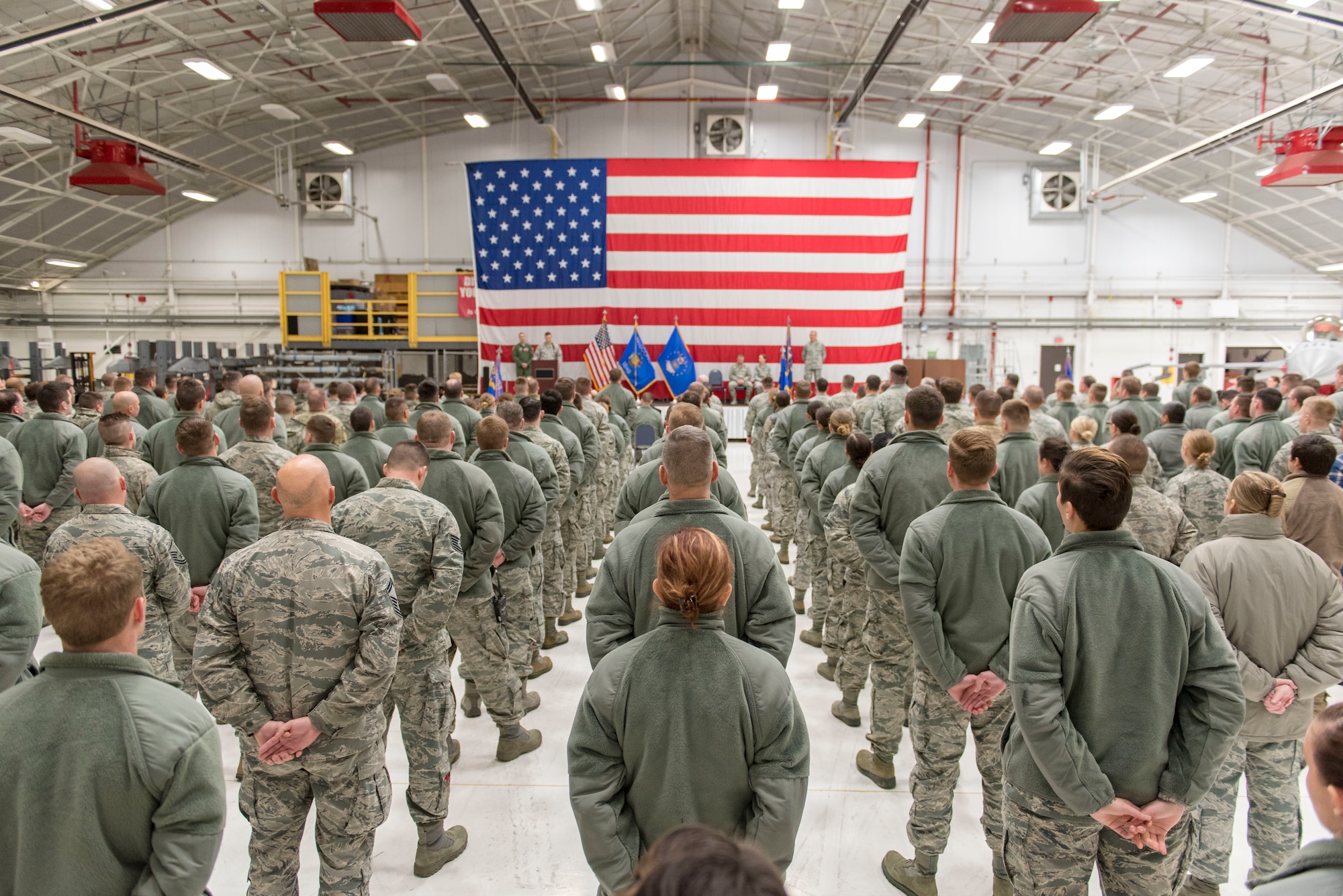 Airmen from the 115th Maintenance Group, Truax Field, Wisconsin, stand in formation during the 115th MXG change of command ceremony December 2, 2018, at the 115th Fighter Wing on Truax. Col. Christopher Green is reliquishing command of the 115th MXG to Lt. Col. Wilhelmina Panzer. (U.S. Air National Guard photo by Airman 1st Class Cameron Lewis)