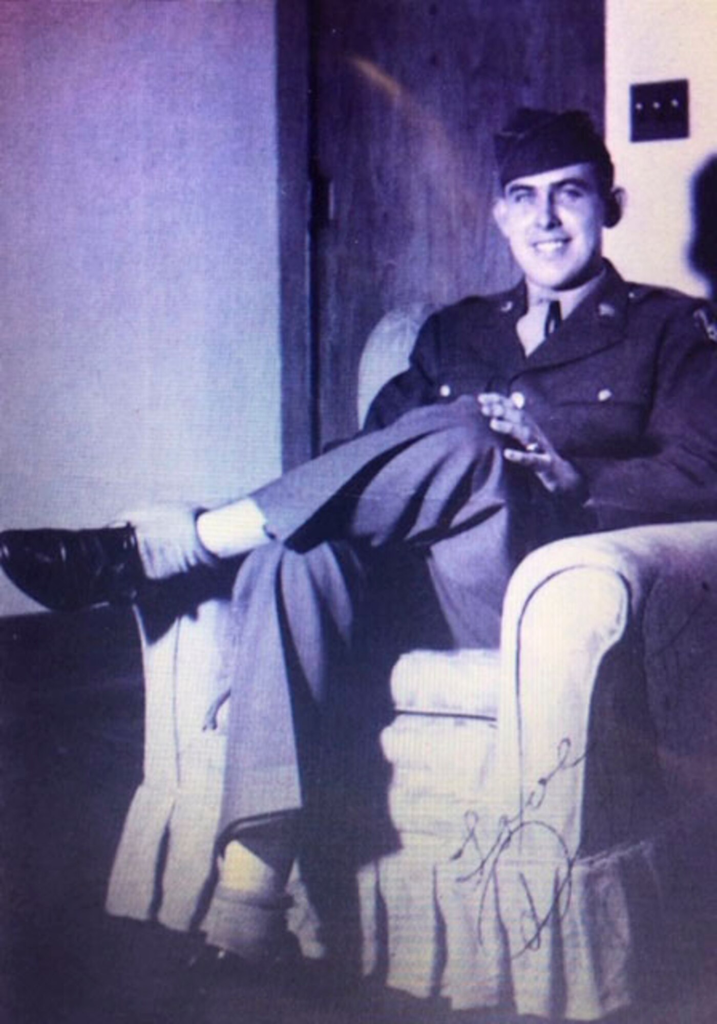 The late retired Col. Delbert L. Mueller poses for a photo at his home in Lebanon, Ill. before attending the Aviation Cadet Program in 1943.