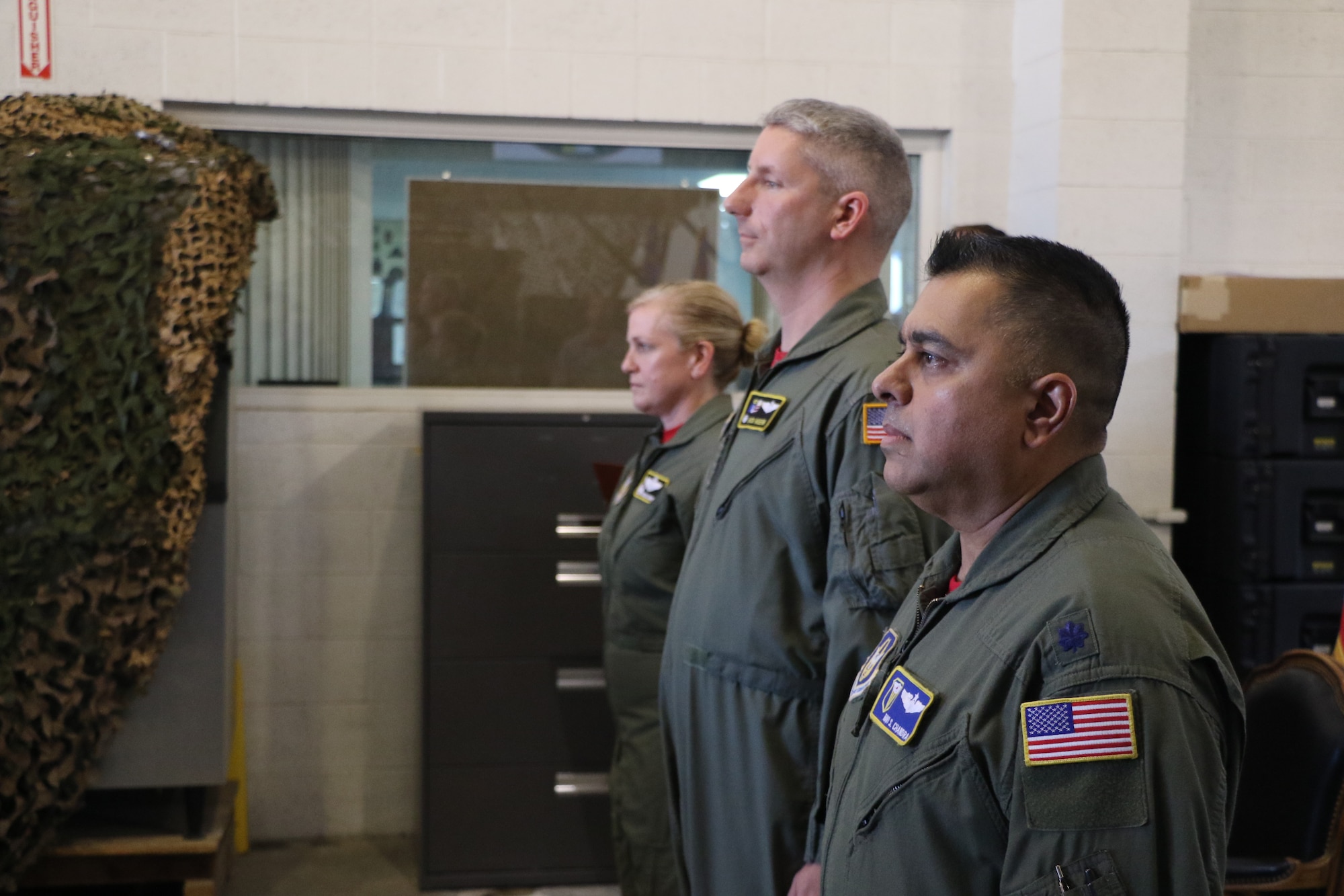 Lt. Col. Ravi Chandra, commander, 452nd Contingency Response Squadron, March Air Reserve Base, stands at attention during an assumption of command ceremony in building 2321 here on Saturday, Oct. 27. The ceremony was attended by Chandra’s family and friends, base leadership and Team March Airmen. Chandra’s appointment as commander of the 452nd CRS was effective Oct. 1, 2018.