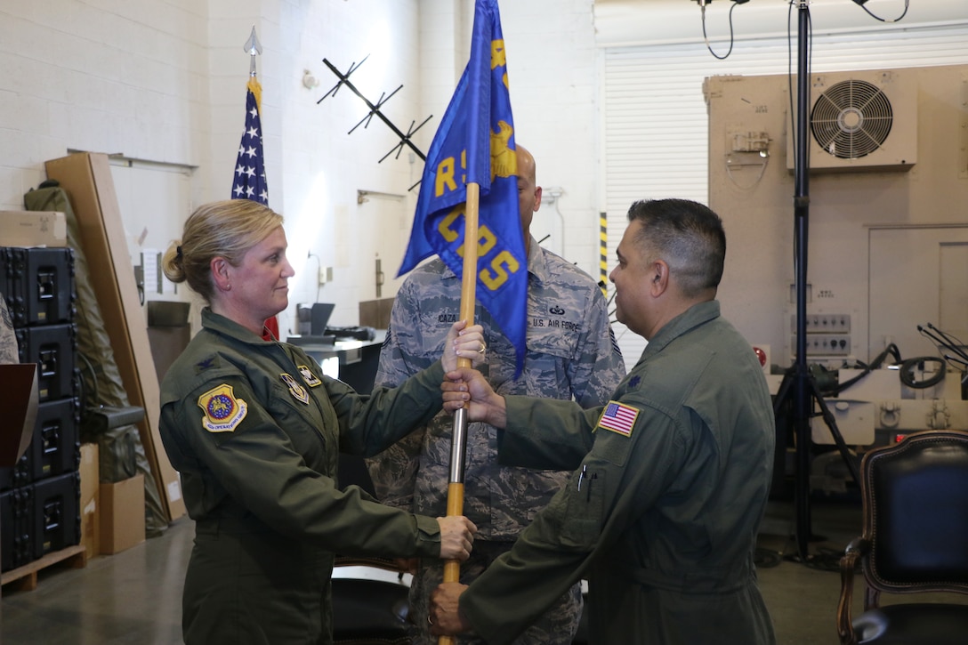 Lt. Col. Ravi Chandra, commander, 452nd Contingency Response Squadron, March Air Reserve Base, stands at attention during an assumption of command ceremony in building 2321 here on Saturday, Oct. 27. The ceremony was attended by Chandra’s family and friends, base leadership and Team March Airmen. Chandra’s appointment as commander of the 452nd CRS was effective Oct. 1, 2018.