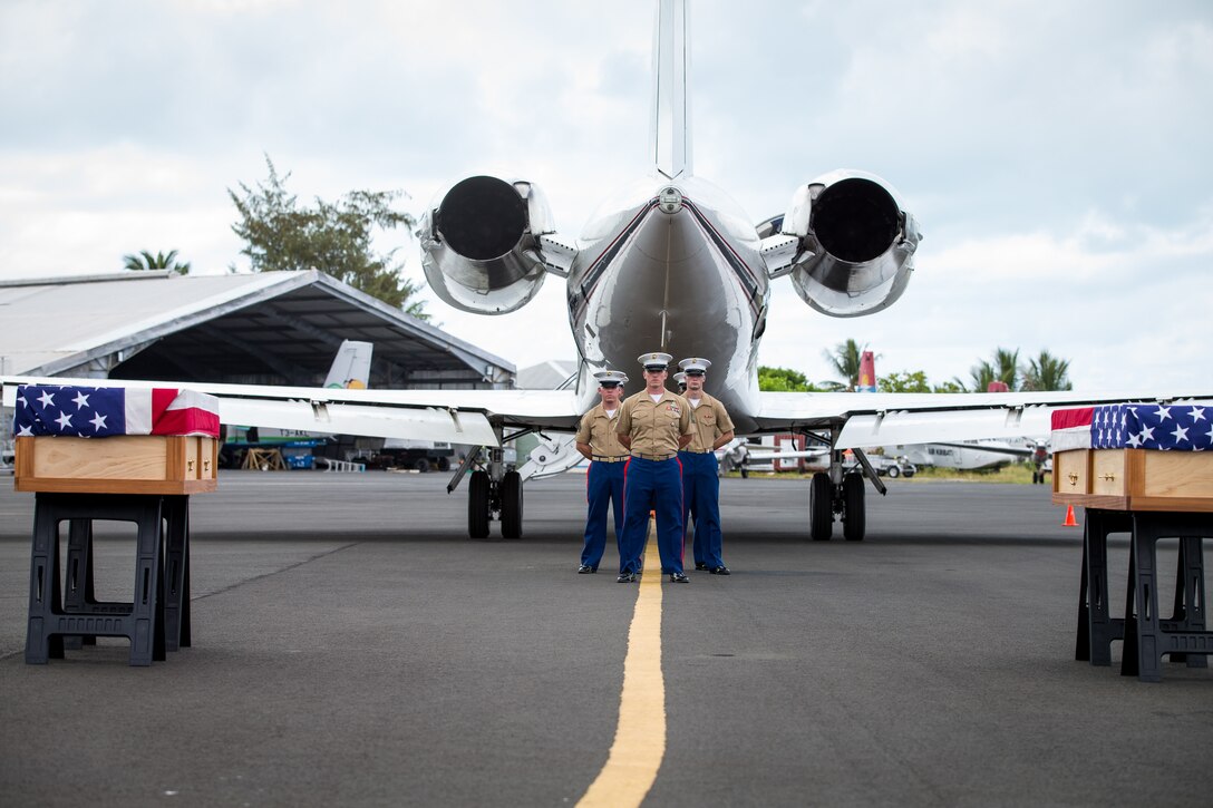 U.S. Marines with Defense POW/MIA Accounting Agency and Marine Forces Pacific, participate in a repatriation ceremony in Betio, Tarawa Atoll, Republic of Kiribati, Nov. 20, 2018. The ceremony was held to memorialize all who made the ultimate sacrifice during the Battle of Tarawa in 1943, and honorably transfer several remains and artifacts back to the continental U.S. (U.S. Marine Corps photo by Sgt. Timothy Turner)