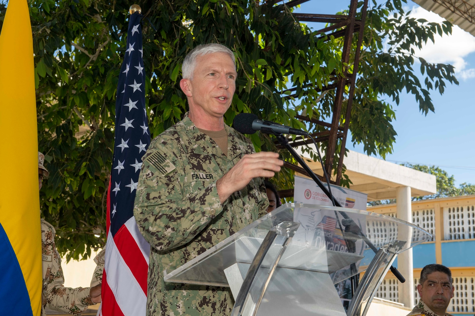 Adm. Craig Faller, commander, U.S. Southern Command, delivers remarks during the closing ceremony at a land-based medical site.