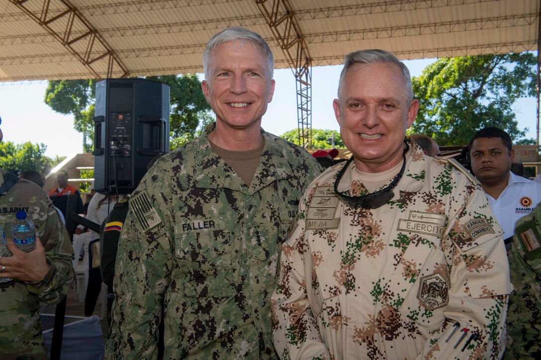 Adm. Craig Faller, commander, U.S. Southern Command, and Colombian Gen. Alberto Mejía, general commander, Colombian Military Forces, pose for a photo during the closing ceremony at a land-based medical site.