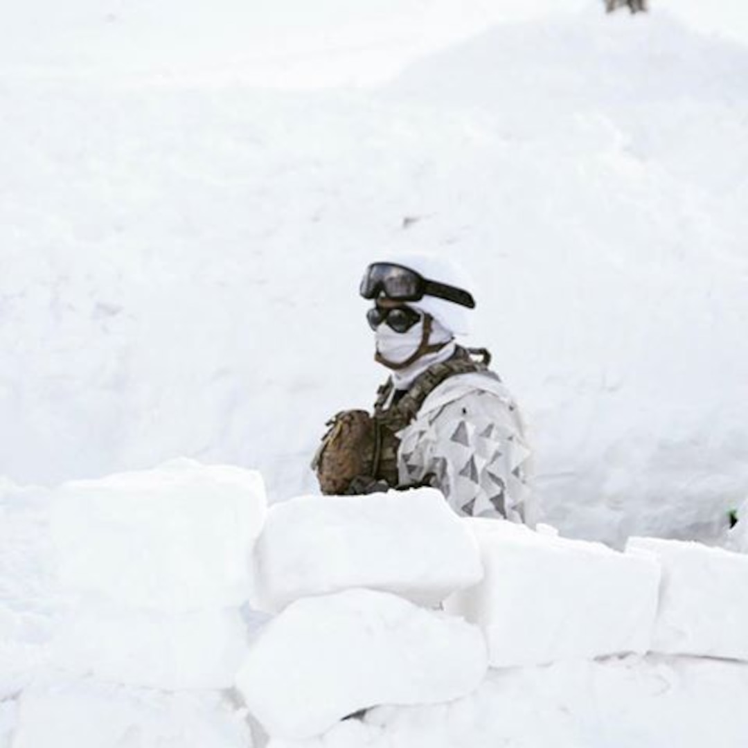 A student of the Chilean Mountain Warfare School stands in the snow during the winter portion of the course in the Chilean Andes mountains.