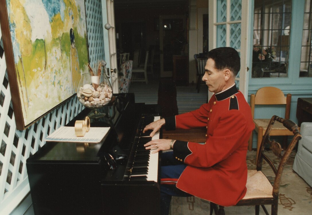 On July 10, 1990, Master Gunnery Sgt. Charles Corrado performed at dinner for President George H. W. Bush and Japanese Prime Minister Toshiki Kaifu at Kennebunkport, Maine, as the two leaders prepared for the upcoming Economic Summit of the Industrialized Nations in London. (Photo courtesy of the George H. W. Bush Presidential Library)
