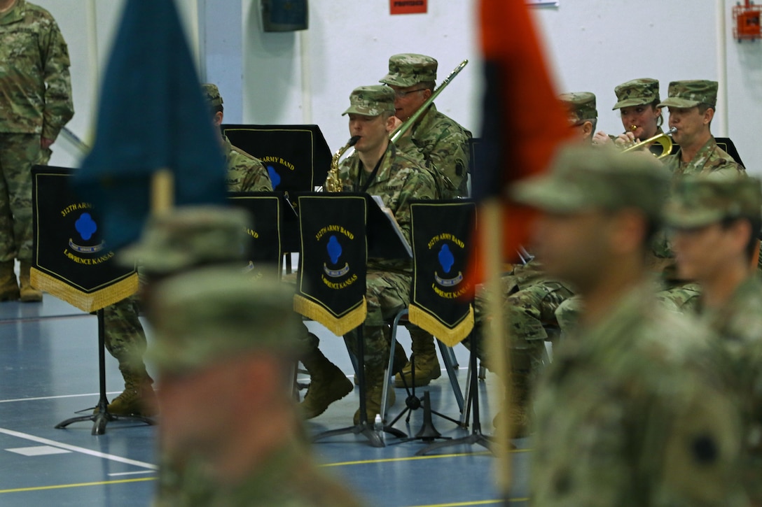 A performance group from the 312th Army Band, Lawrence, Kansas, plays the Blue Devil March at the end of the 88th Readiness Division change of command ceremony at Fort McCoy, Wisconsin, December 1, 2018.