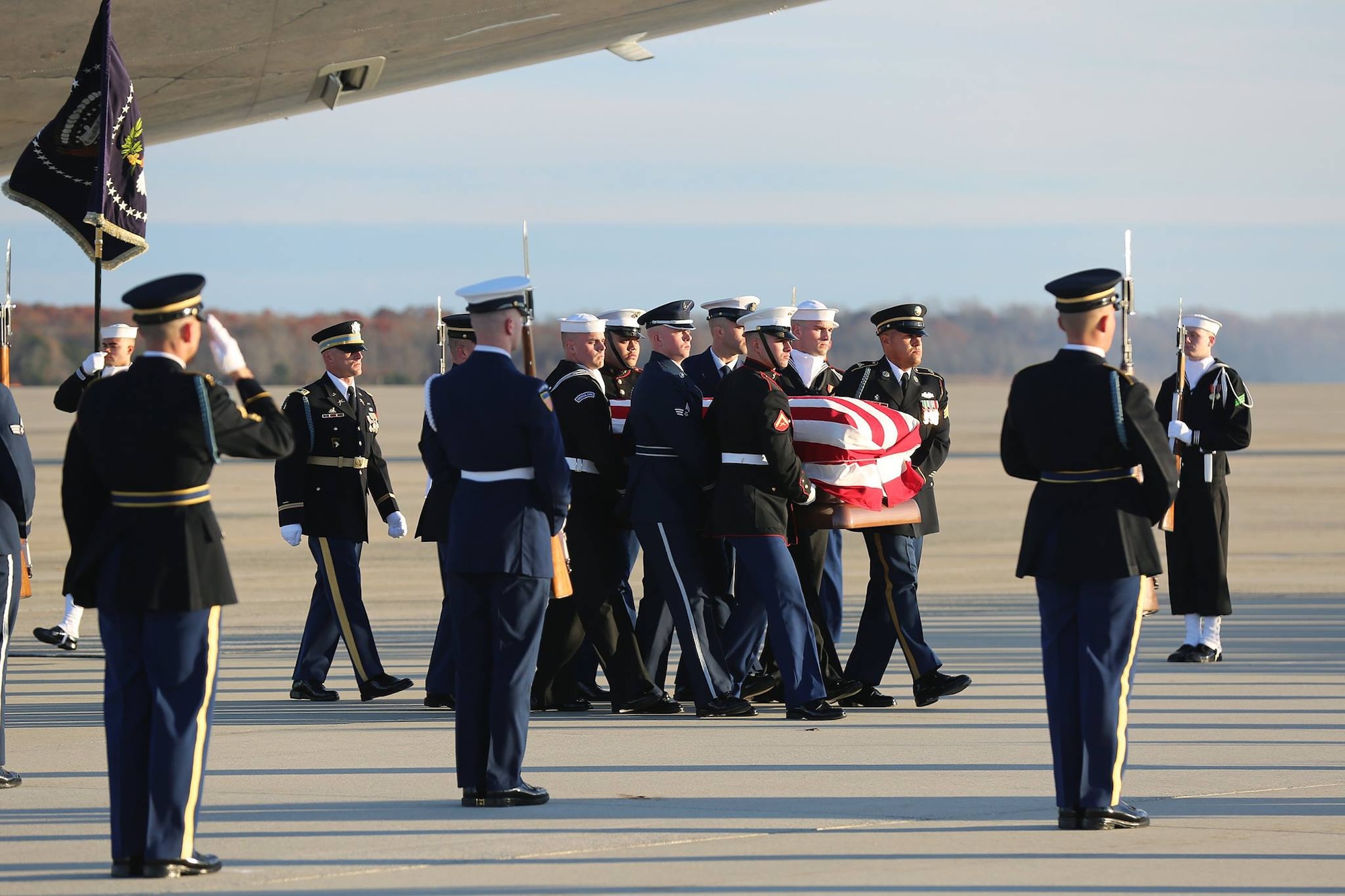 U.S. service members prepare to place the casket of George H.W. Bush, 41st President of the United States, into a hearse, Joint Base Andrews, Maryland, Dec. 03, 2018.