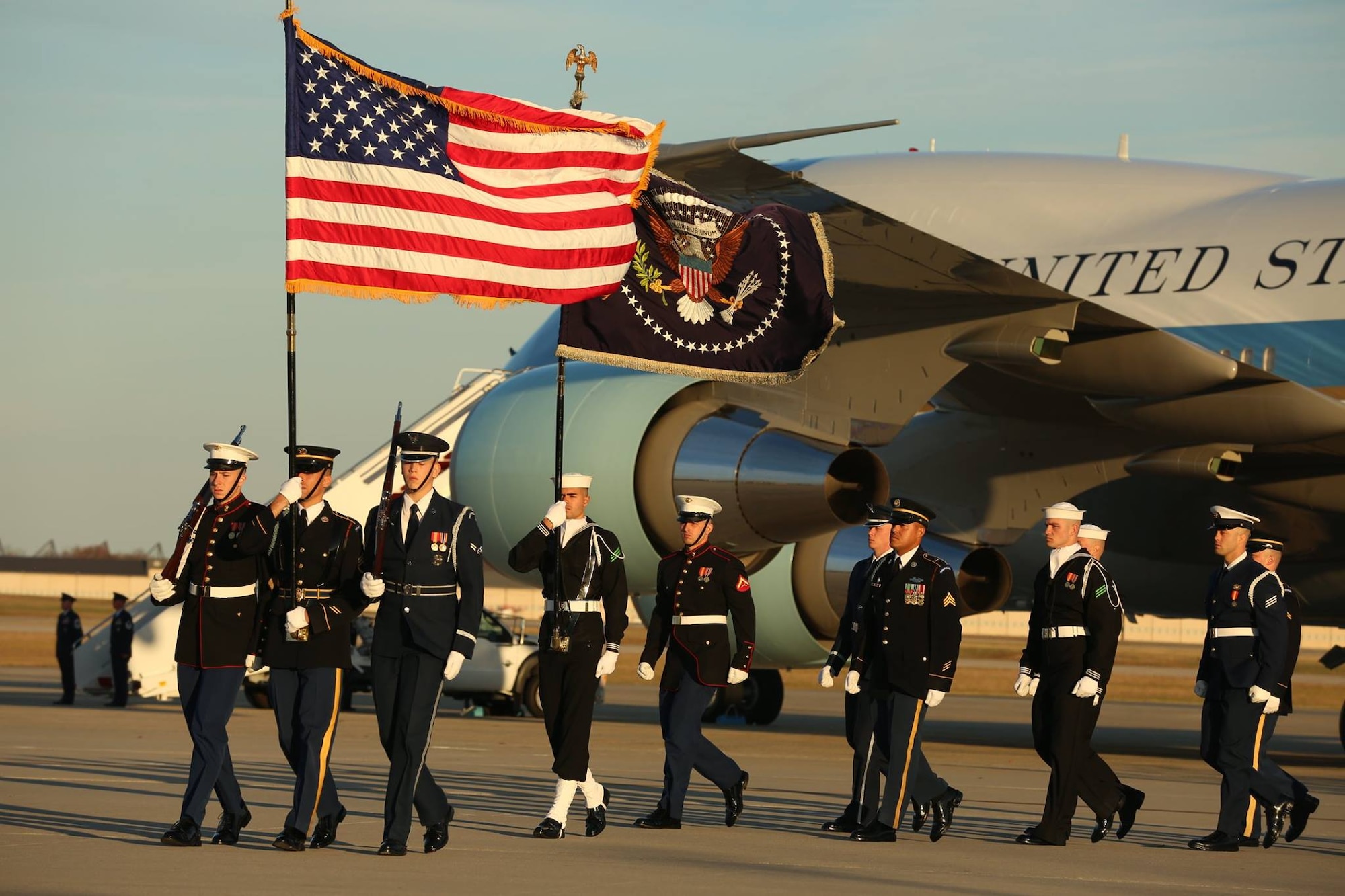 U.S. service members with the Ceremonial Honor Guard march off as the casket of George H. W. Bush, the 41st President of the United States,departs Andrews Air Base, Md., Dec. 03, 2018.