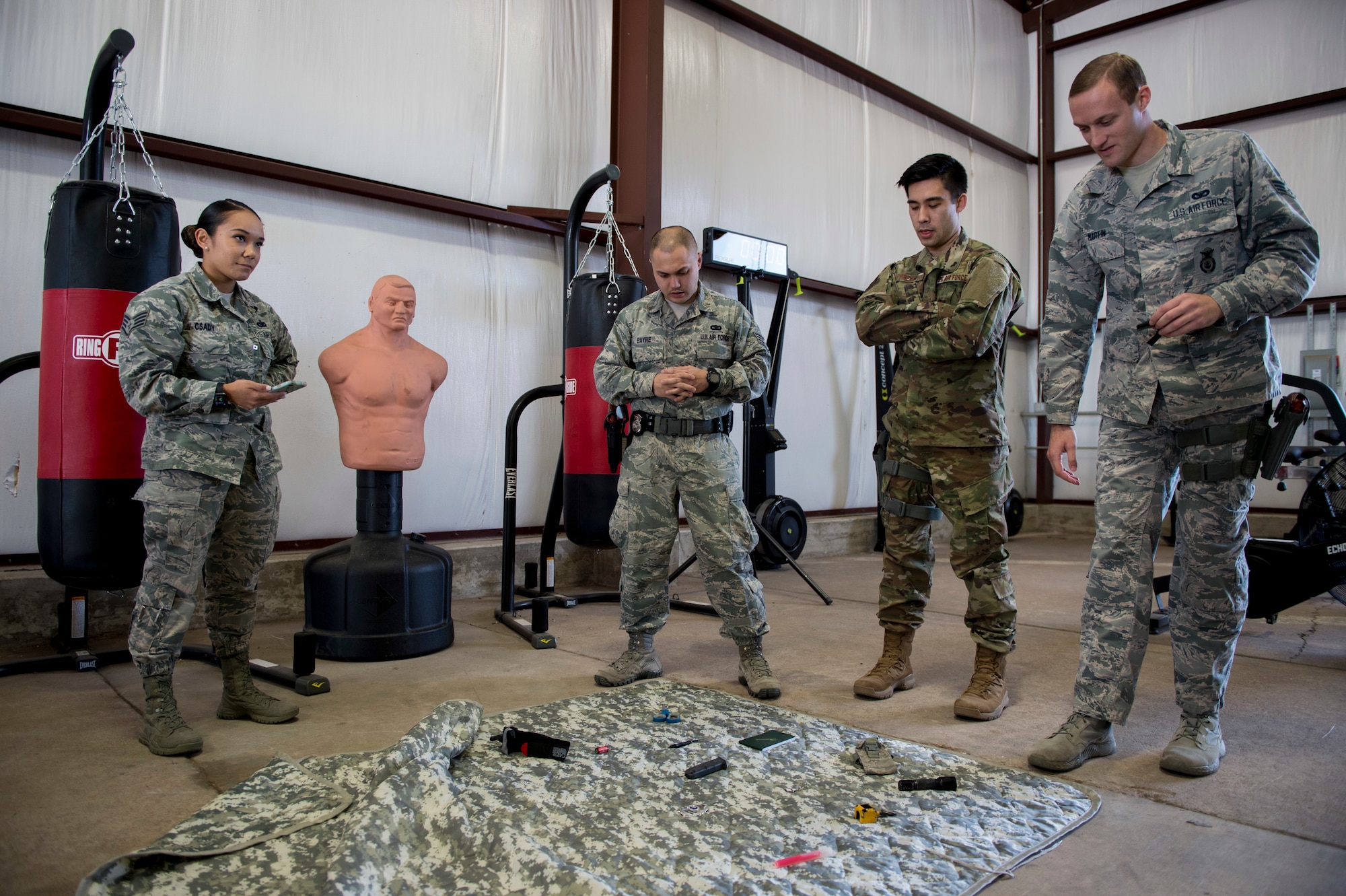 Members of the 97th Security Forces Squadron staff support team memorized items they had to recall after a timed competition at the new Warrior Training Center