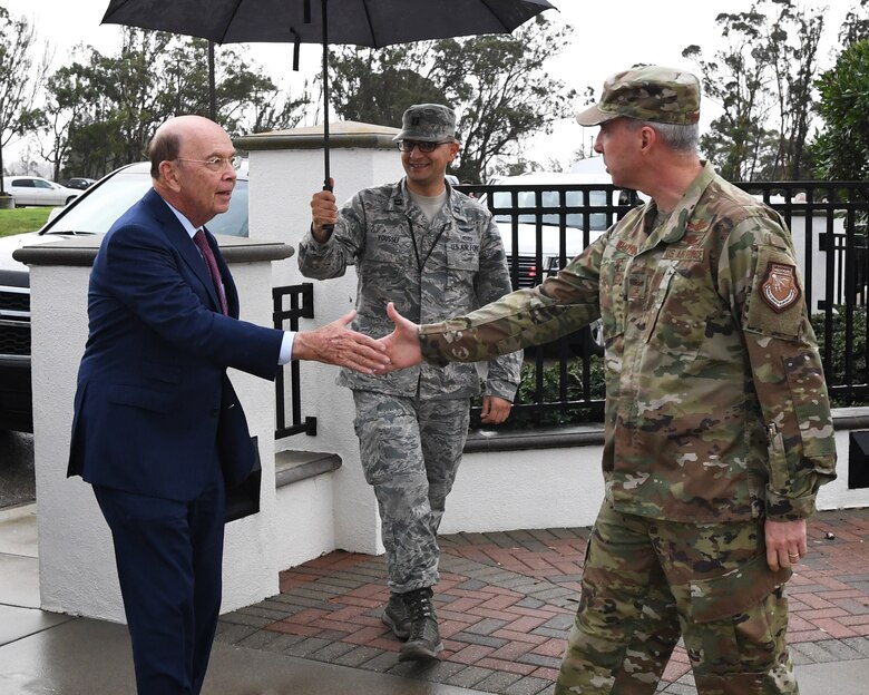 Deputy Joint Force Space Component Commander Maj. Gen. Stephen Whiting (right) greets U.S. Secretary of Commerce Wilbur Ross (left) during a visit at Vandenberg AFB, Calif., Nov. 29, 2018. Secretary Ross met with service members from the 18th Space Control Squadron, Combined Space Operations Center, Joint Force Space Component Command and U.S. Strategic Command to discuss Space Situational Awareness capabilities and space operations during a visit here Nov. 29-30. Secretary Ross also spoke with service members about the Department of Defense transitioning non-military aspects of Space Situational Awareness and space safety monitoring and responsibilities to the Department of Commerce. (U.S. Air Force photo by Maj. Cody Chiles)