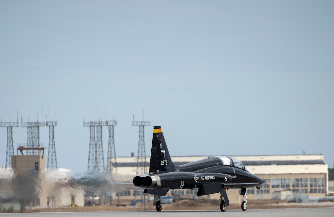 A formation of T-38 Talons fly in formation over the runway Nov. 30 at Eglin Air Force Base, Fla. Seven Talons arrived here, their temporary home as part of a mission shift by the Air Force as Hurricane Michael recovery efforts continue at Tyndall. The 2nd FS is one of two T-38 Talon adversary squadrons. They provide air-to-air threat replication to support F-22 Raptor combat and formal training squadrons. The squadron also maintains readiness to augment worldwide combat operations.