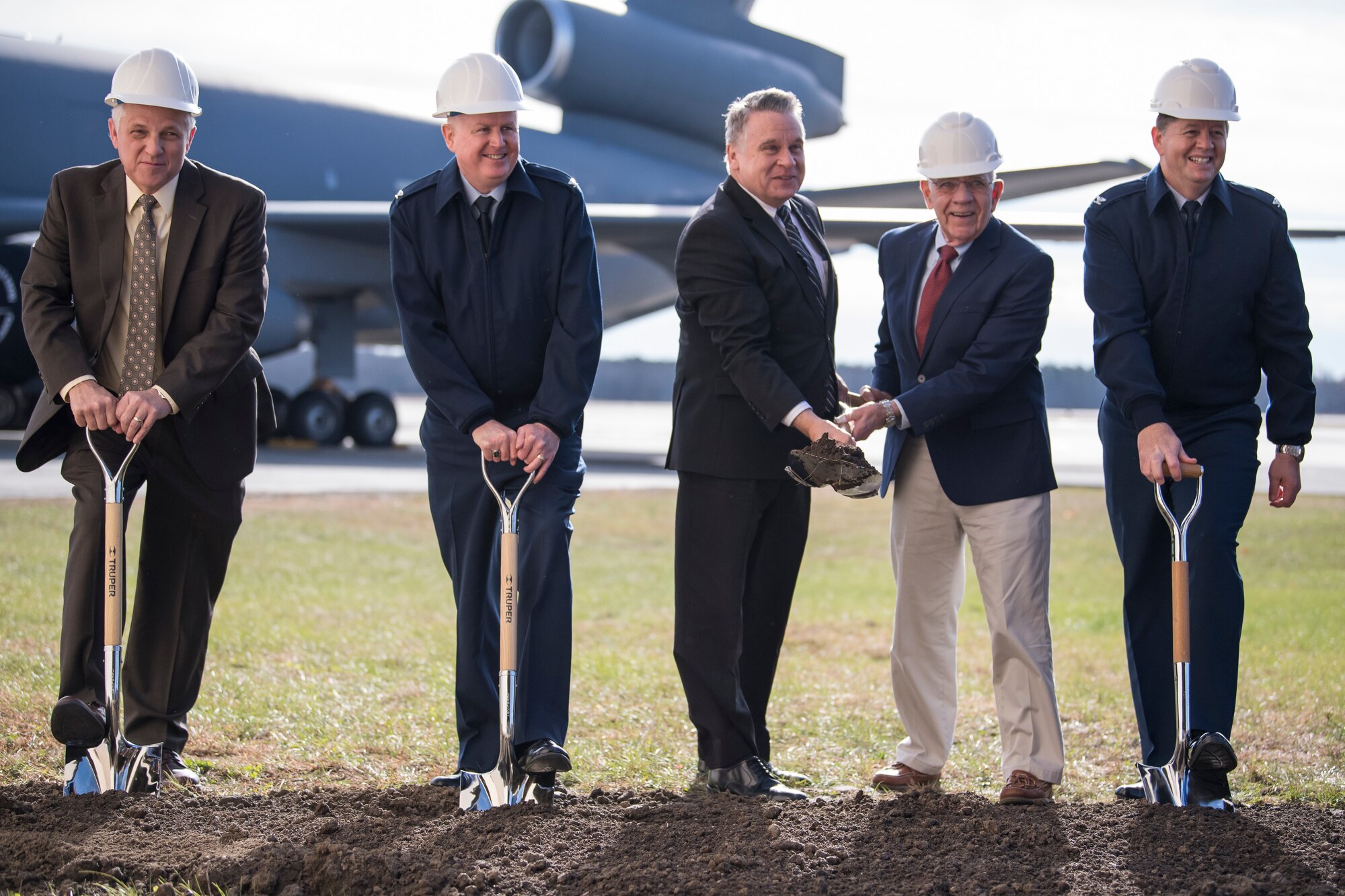 Base leaders and state representatives took part in the ceremony, which represented the beginning of an $82.5 million two-bay hanger construction, part of a larger $146.5 million project, to house 24 new KC-46 Pegasus refueling jets. The KC-46, set to start arriving the summer of 2021, will replace the base's current KC-10 Extender aircraft. (U.S. Air Force photo by Christian DeLuca)