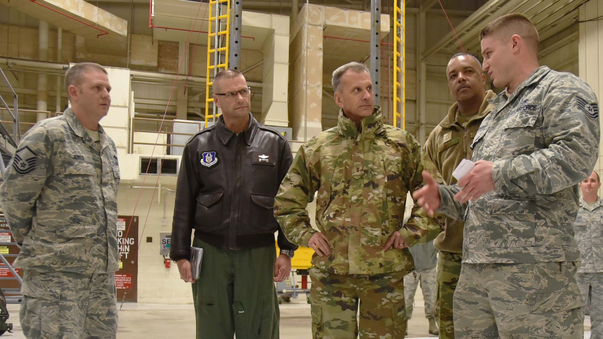 Maj. Gen. Randall A. Ogden, 4th Air Force commander, and Chief Master Sgt. Timothy White, 4th Air Force command chief, speak with members of the 931st Maintenance Group Dec. 2, 3018, McConnell Air Force Base, Kan.  During his visit, Ogden visited with 931 ARW units and asked them to voice any questions or concerns they had about the future of the Air Force Reserve.