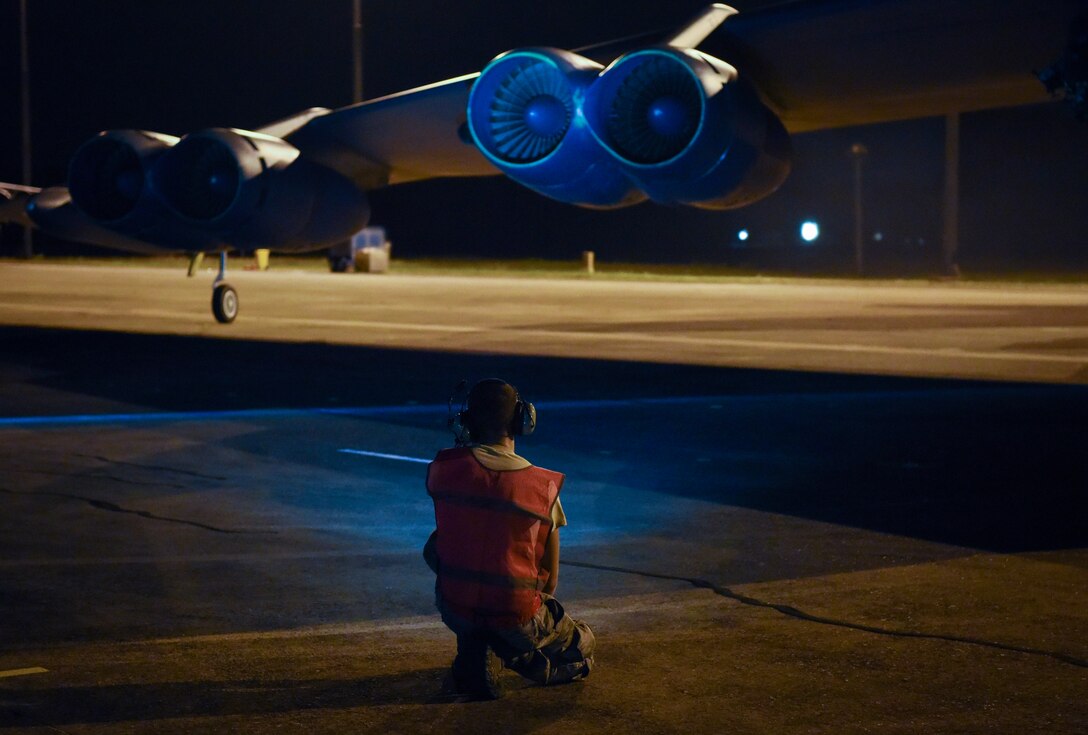 Airman 1st Class Nicholas Casillas, 96th Expeditionary Bomb Squadron crew chief, checks a U.S. Air Force B-52 Stratofortress engine before take-off at Royal Australian Air Force (RAAF) Base Darwin, Australia, Dec. 3, 2018.