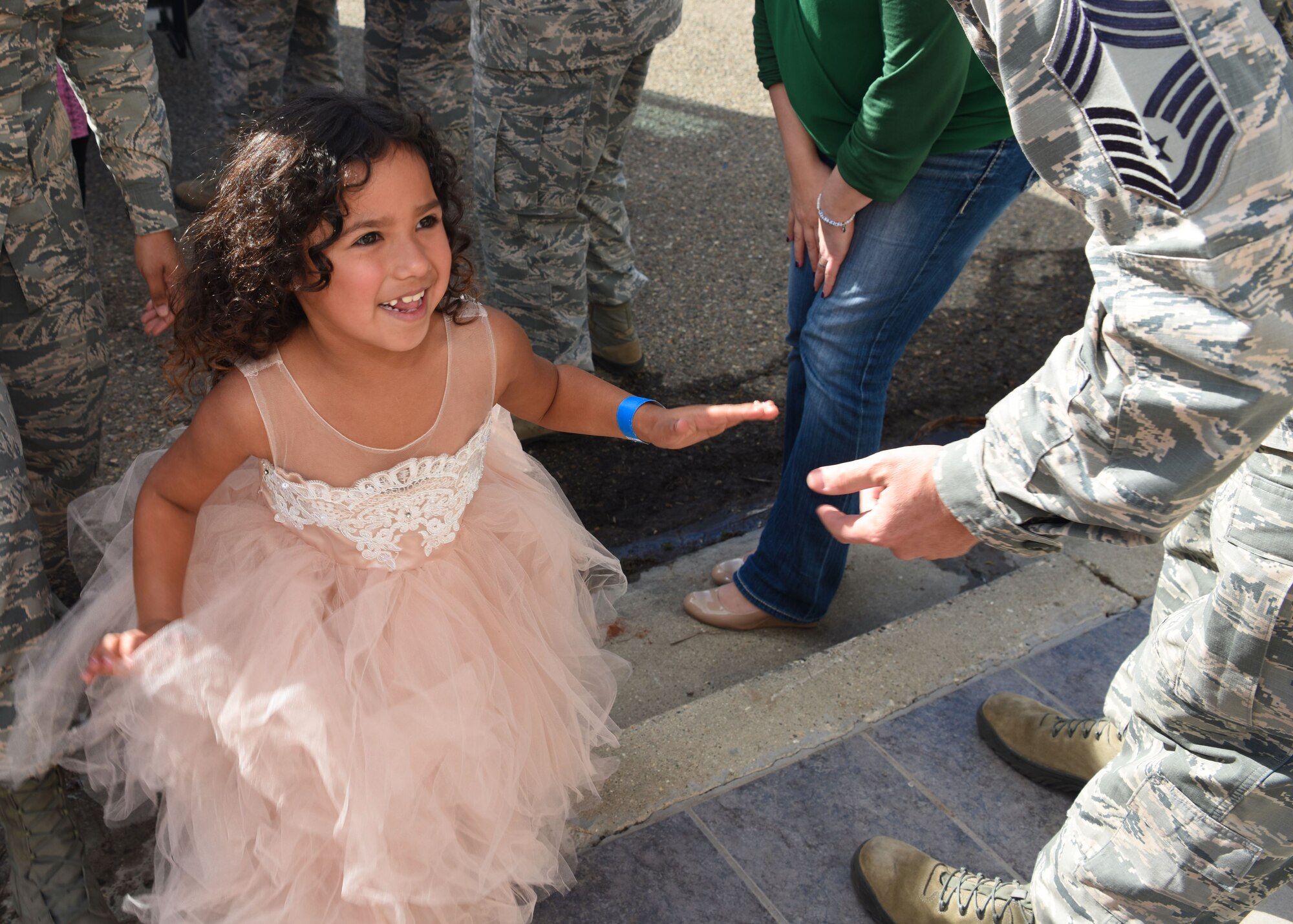 Team Vandenberg greets the children participating in Operation Kids Christmas, at the Pacific Coast Club at Vandenberg Air Force Base, Calif. Dec. 1, 2018. Vandenberg hosts the 59th annual Operation Kids Christmas here, expecting 200 kids from nearby cities to partake in the planned games, crafts, lunch and Christmas gifts.
