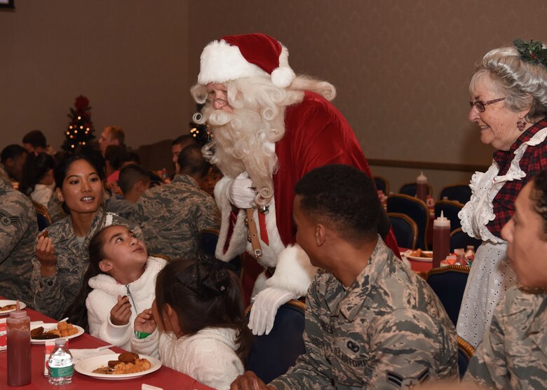 Vandenberg Airmen and Santa bring Christmas joy to children at Operation Kids Christmas at the Pacific Coast Club at Vandenberg Air Force Base, Calif. Dec. 1, 2018. Vandenberg hosts the 59th annual Operation Kids Christmas here, expecting 200 kids from nearby cities to partake in the planned games, crafts, lunch and Christmas gifts.