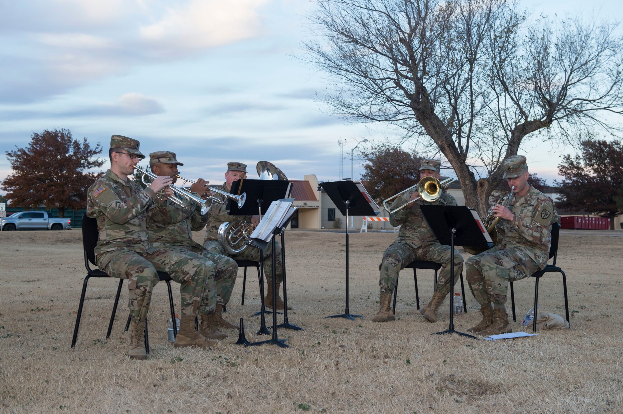 Members of the 97th Air Mobility Wing receive refreshments from the base chapel team, Nov. 29, 2018, at Altus Air Force Base, Okla. The refreshments were provided as part of the annual Holiday Tree Lighting, which takes place at the Wings of Freedom Park. (U.S. Air Force photo by Senior Airman Cody Dowell)