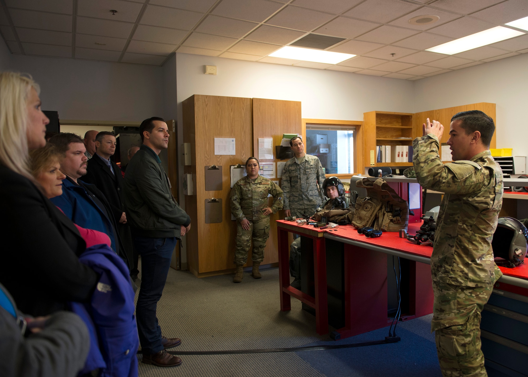 Airmen speaking with civic leaders at Mountain Home Air Force Base, Idaho, Nov. 28, 2018.