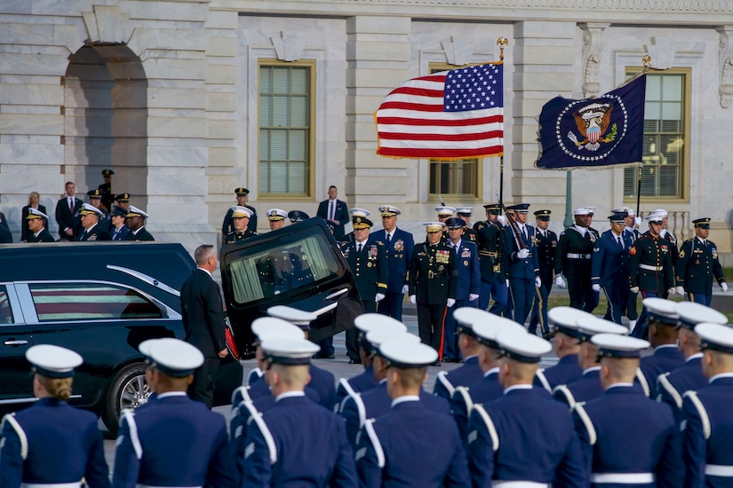 U.S. service members prepare to carry the casket of George H.W. Bush