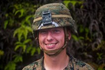 Cpl. Jonathon Cameron prepares to repel down a cliff Dec. 4, 2018 at Jungle Warfare Training Center, Camp Gonsalves, Okinawa, Japan. Marines with 9th Engineer Support Battalion, 3rd Marine Logistics Group, took part in the Basic Jungle Skills Course which includes patrolling, repelling, land navigation and an endurance course. Repelling gives Marines the ability to travel through hill and bluff ridden terrain. Cameron, a combat engineer with Bravo Company, 9th ESB, 3rd MLG, is a native of Arlington, Texas. (U.S. Marine Corps photo by Lance Cpl. Mark Fike)