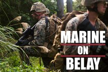 Marines provide security during a patrol Dec. 4, 2018 at Jungle Warfare Training Center, Camp Gonsalves, Okinawa, Japan. Marines with 9th Engineer Support Battalion, 3rd Marine Logistics Group, took part in the Basic Jungle Skills Course which includes patrolling, repelling, land navigation and an endurance course. Jungle Warfare Training Center gives service members the opportunity to train in a jungle environment. (U.S. Marine Corps photo by Lance Cpl. Mark Fike)